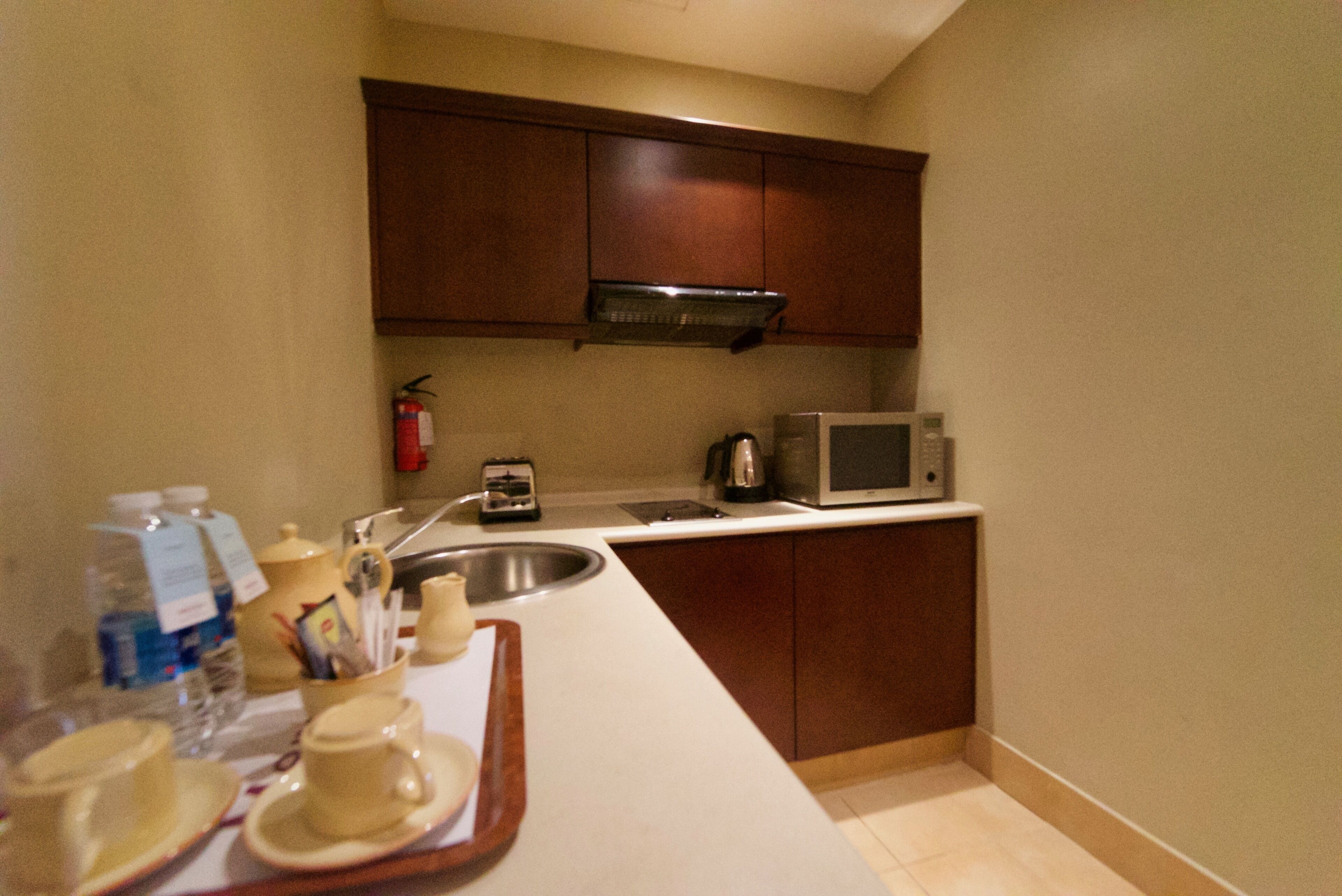 superior studio, 1 king bed, city view | private kitchen | fridge, microwave, stovetop, coffee/tea maker