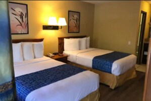 Deluxe Double Room | Desk, blackout drapes, iron/ironing board, free WiFi