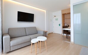 Superior Double Room, Sea View | Living area | Flat-screen TV