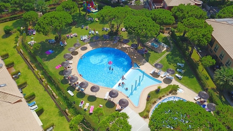 2 outdoor pools, open 9:00 AM to 9:00 PM, pool umbrellas, sun loungers