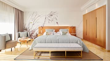 A modern hotel room with a large bed, a sofa, a small table, and a large window with curtains.