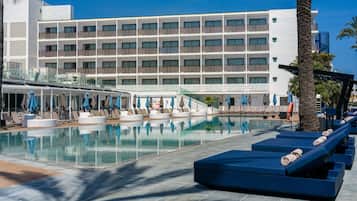 Outdoor pool, open 10:00 AM to 8:00 PM, pool umbrellas, pool loungers