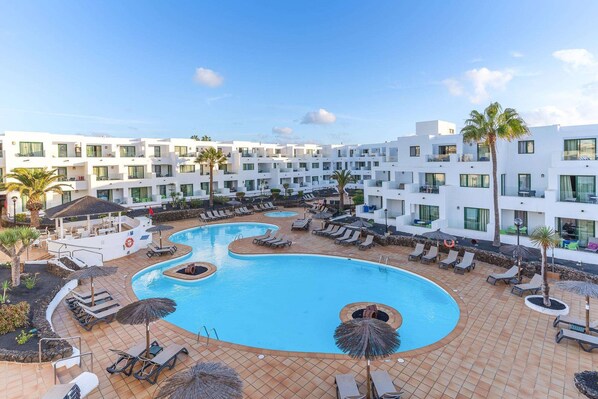 2 outdoor pools, pool umbrellas, sun loungers