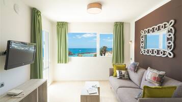 Apartment, 1 Bedroom, Sea View | Living room | LCD TV