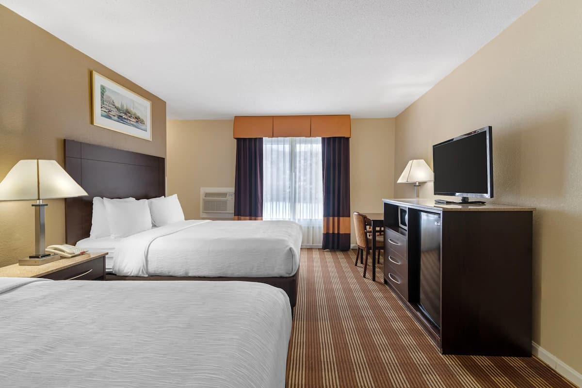 Standard Room, 2 Queen Beds, Non Smoking | Desk, blackout drapes, iron/ironing board, free WiFi