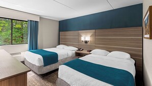 A hotel room with two beds, a desk, and a window with curtains. - Best Western West Lebanon-Hanover Hotel (West Lebanon)