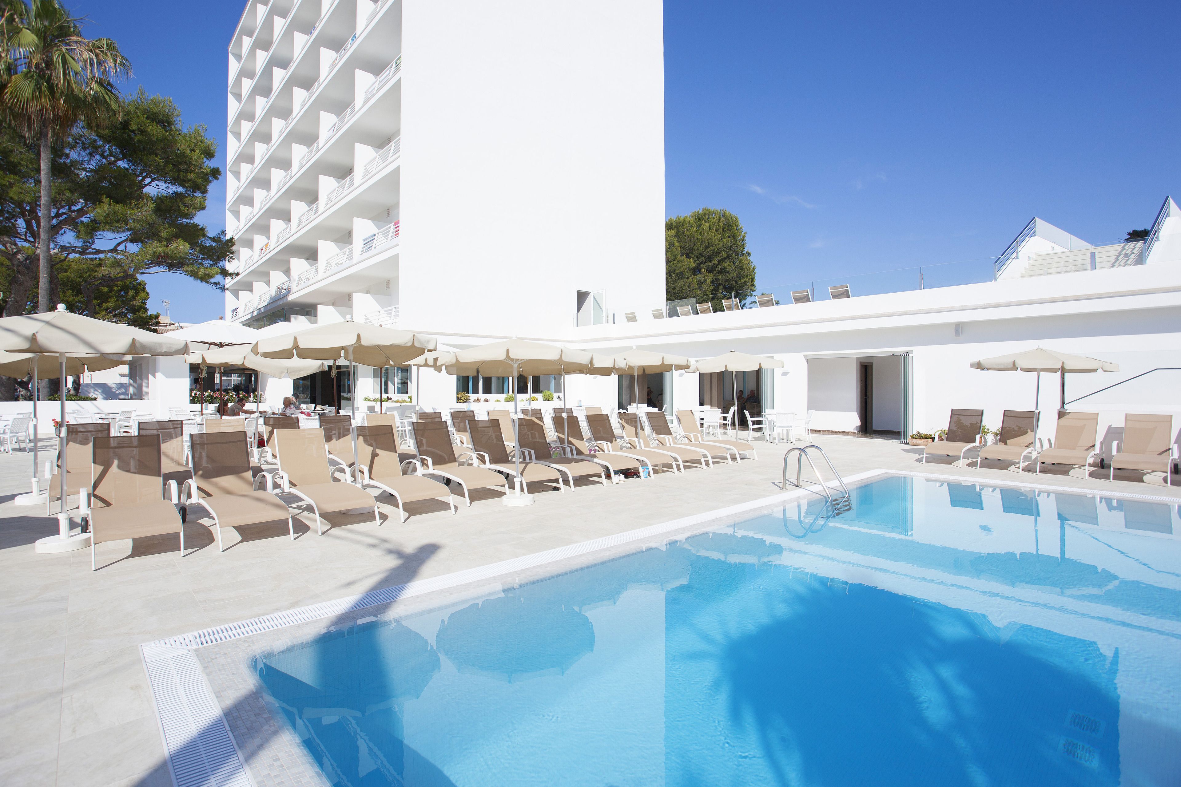 indoor pool, outdoor pool, pool umbrellas, pool loungers