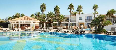 Indoor pool, seasonal outdoor pool, pool loungers, lifeguards on site