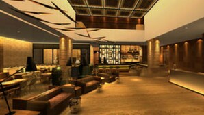 A spacious lobby with a bar area, seating arrangements, and a modern ceiling design. - Lemon Tree Premier City Center Gurugram (Gurugram)