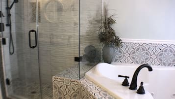 Designer toiletries, hair dryer, towels, soap