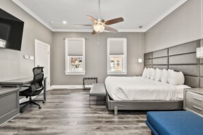 Whirlpool Suite, 1 King bed | Living area | 37-inch flat-screen TV with cable channels, TV