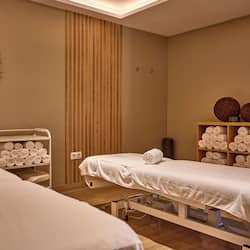 Sauna, hot tub, steam room, body treatments, mud baths, facials