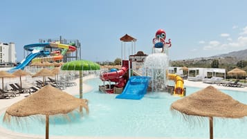 Indoor pool, outdoor pool, pool umbrellas, pool loungers