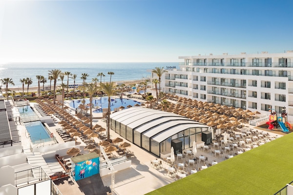 Indoor pool, outdoor pool, pool umbrellas, sun loungers