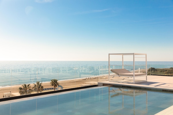 Indoor pool, outdoor pool, pool umbrellas, sun loungers