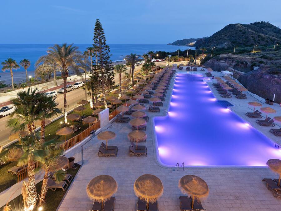 Outdoor pool, pool umbrellas, sun loungers