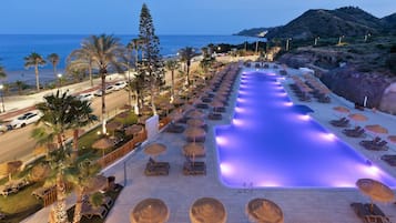 Outdoor pool, pool umbrellas, pool loungers
