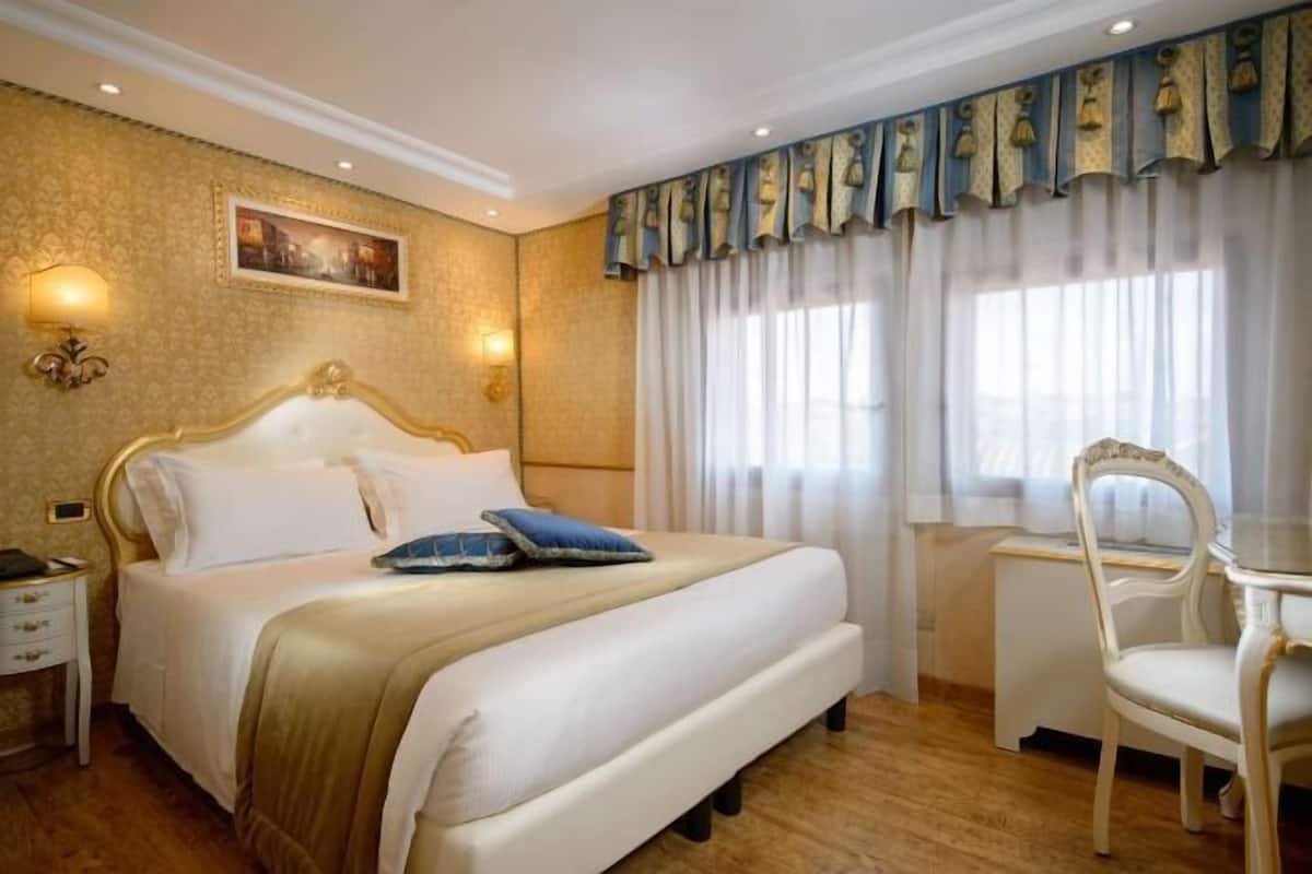 Down comforters, minibar, in-room safe, desk