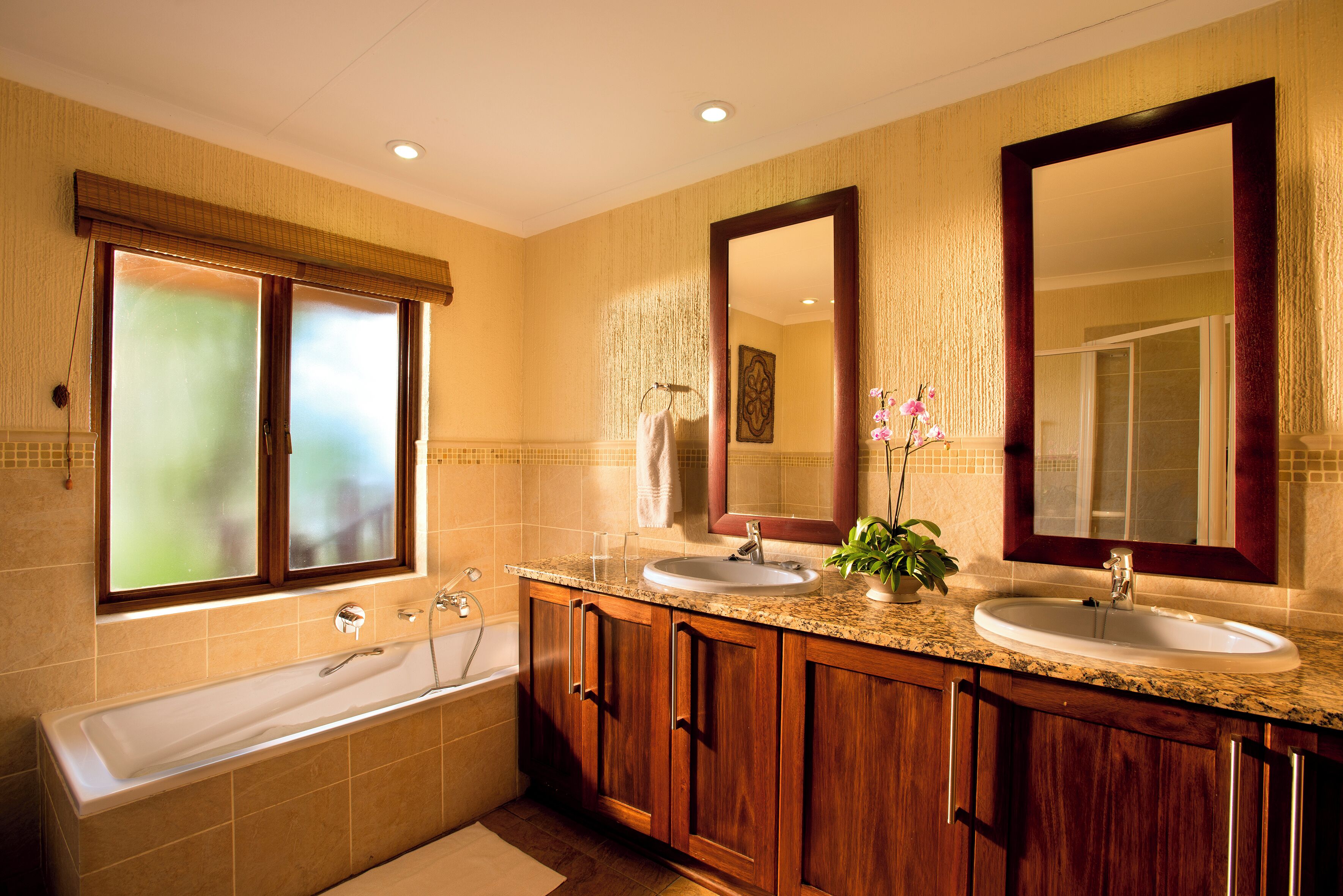 Separate bathtub and shower, rainfall showerhead, free toiletries