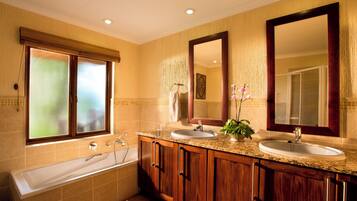 Separate bathtub and shower, rainfall showerhead, free toiletries