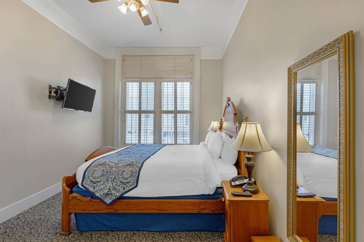 Premium bedding, down duvets, pillow-top beds, laptop workspace