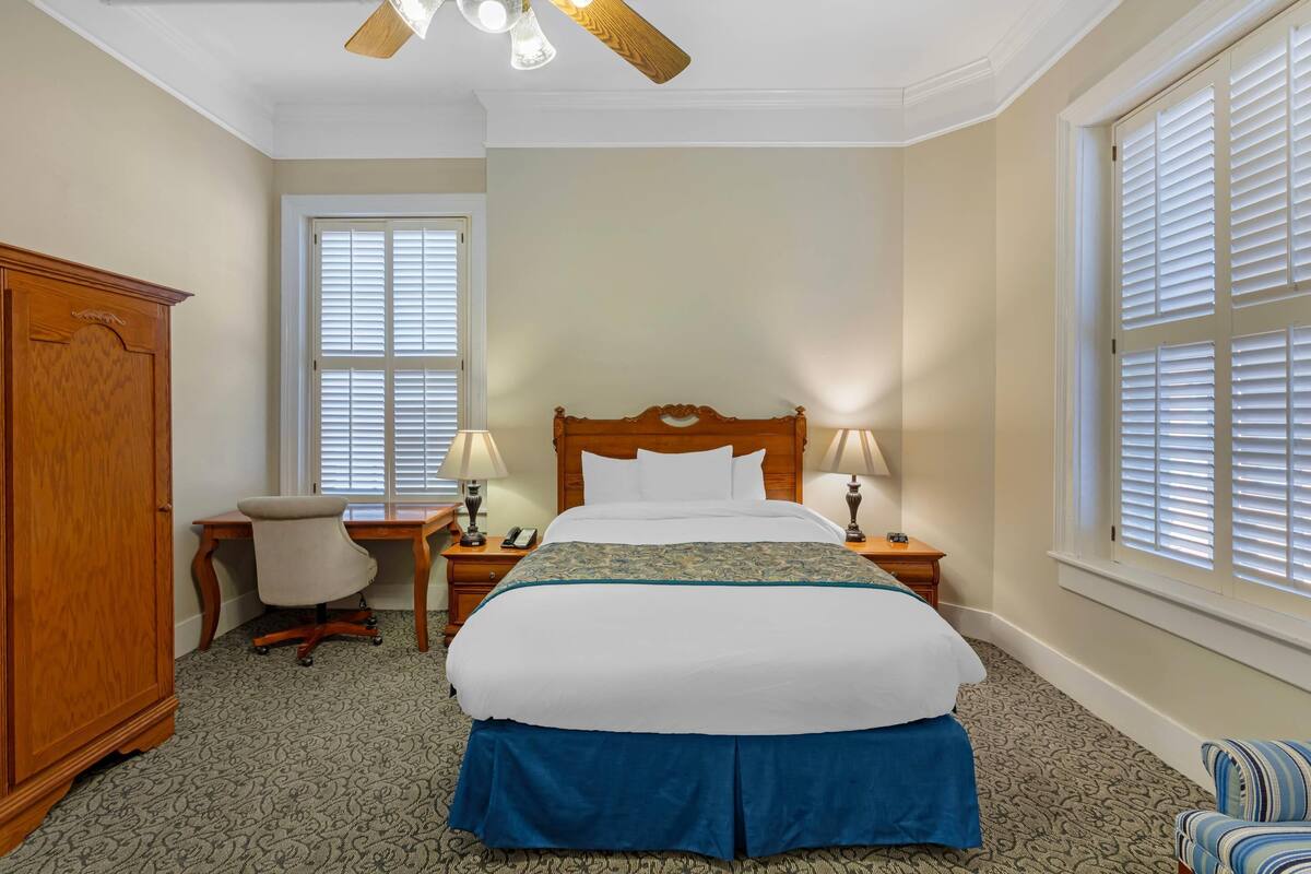 Premium bedding, down duvets, pillow-top beds, laptop workspace