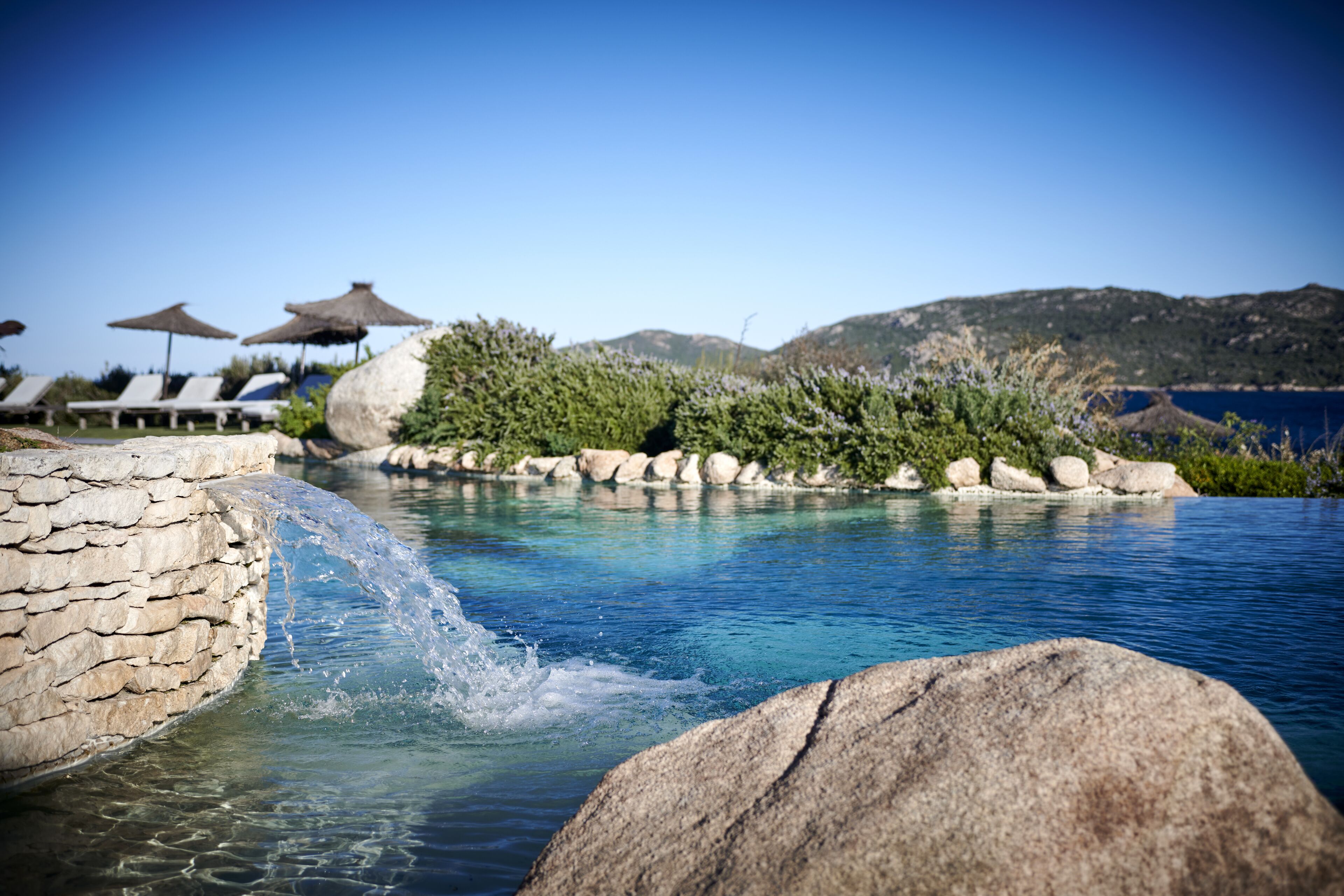 outdoor pool, open 8:00 am to 8:00 pm, pool umbrellas, pool loungers