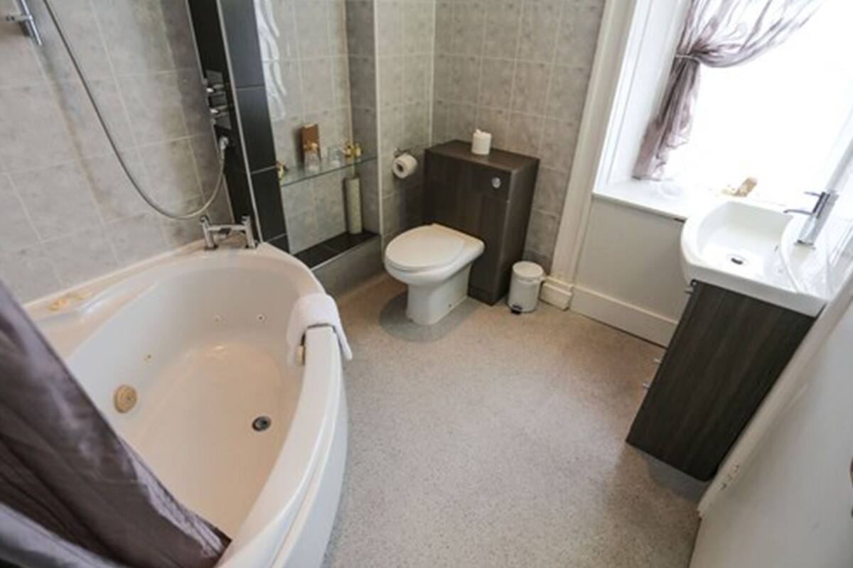 four poster suite | bathroom | hair dryer, towels