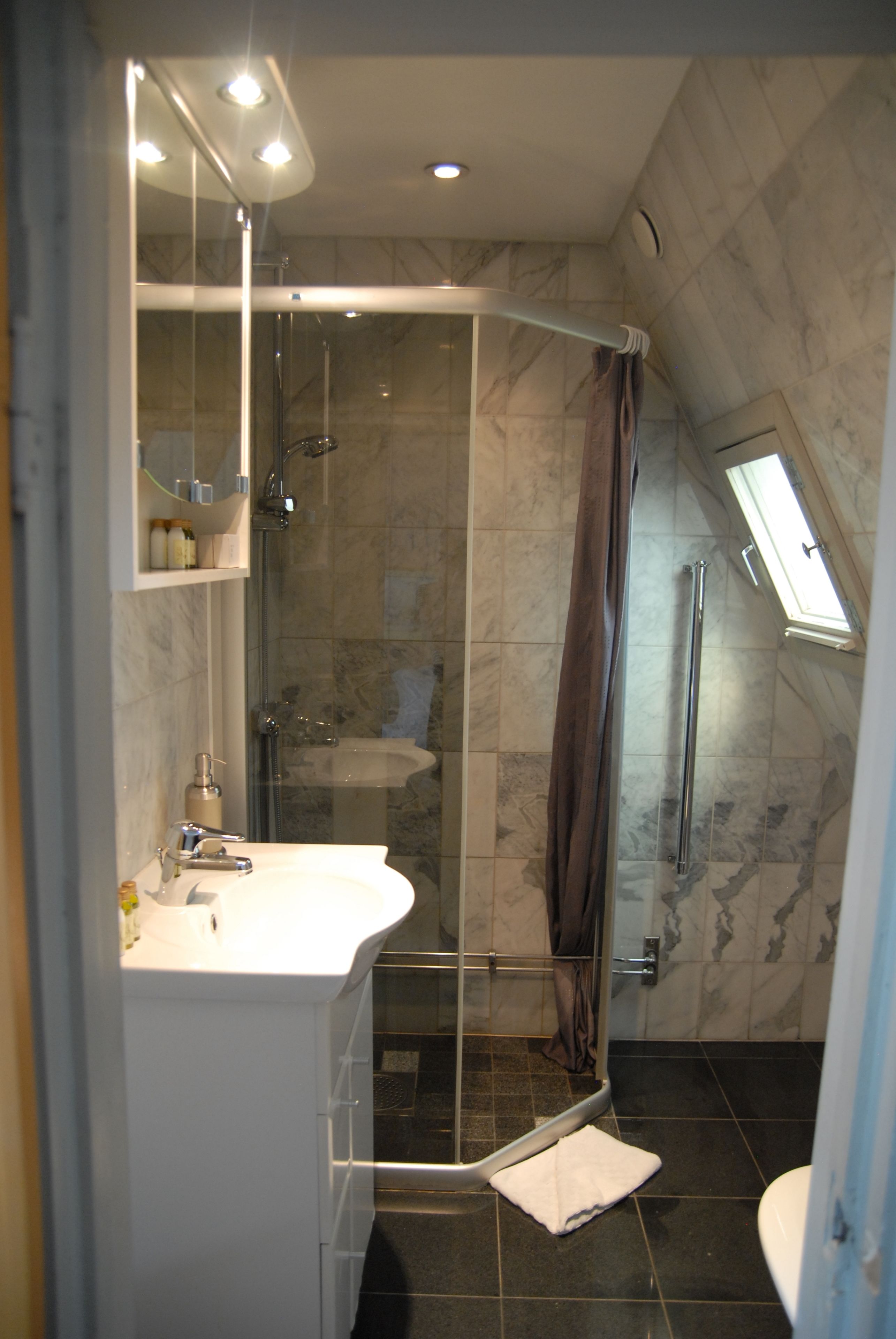 suite | bathroom | shower, designer toiletries, hair dryer, towels