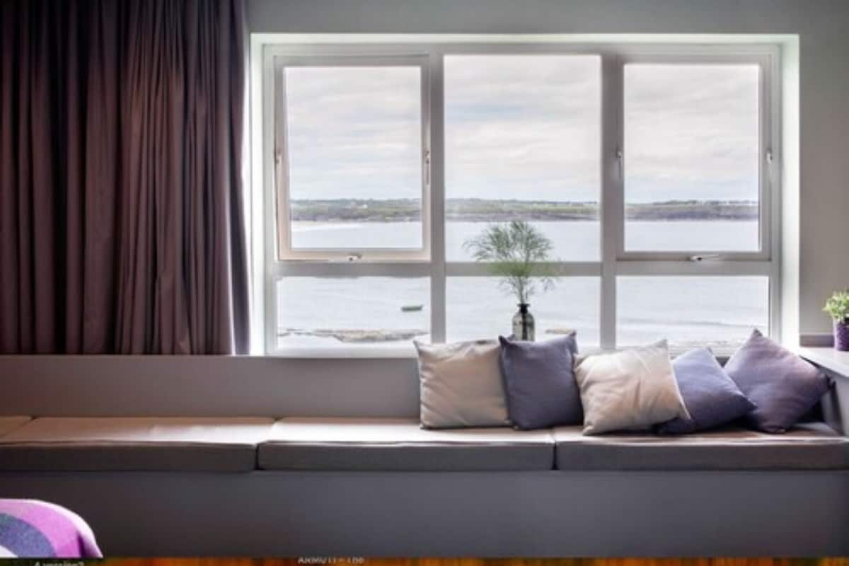 seascape suite | in-room safe, desk, blackout curtains, iron/ironing board