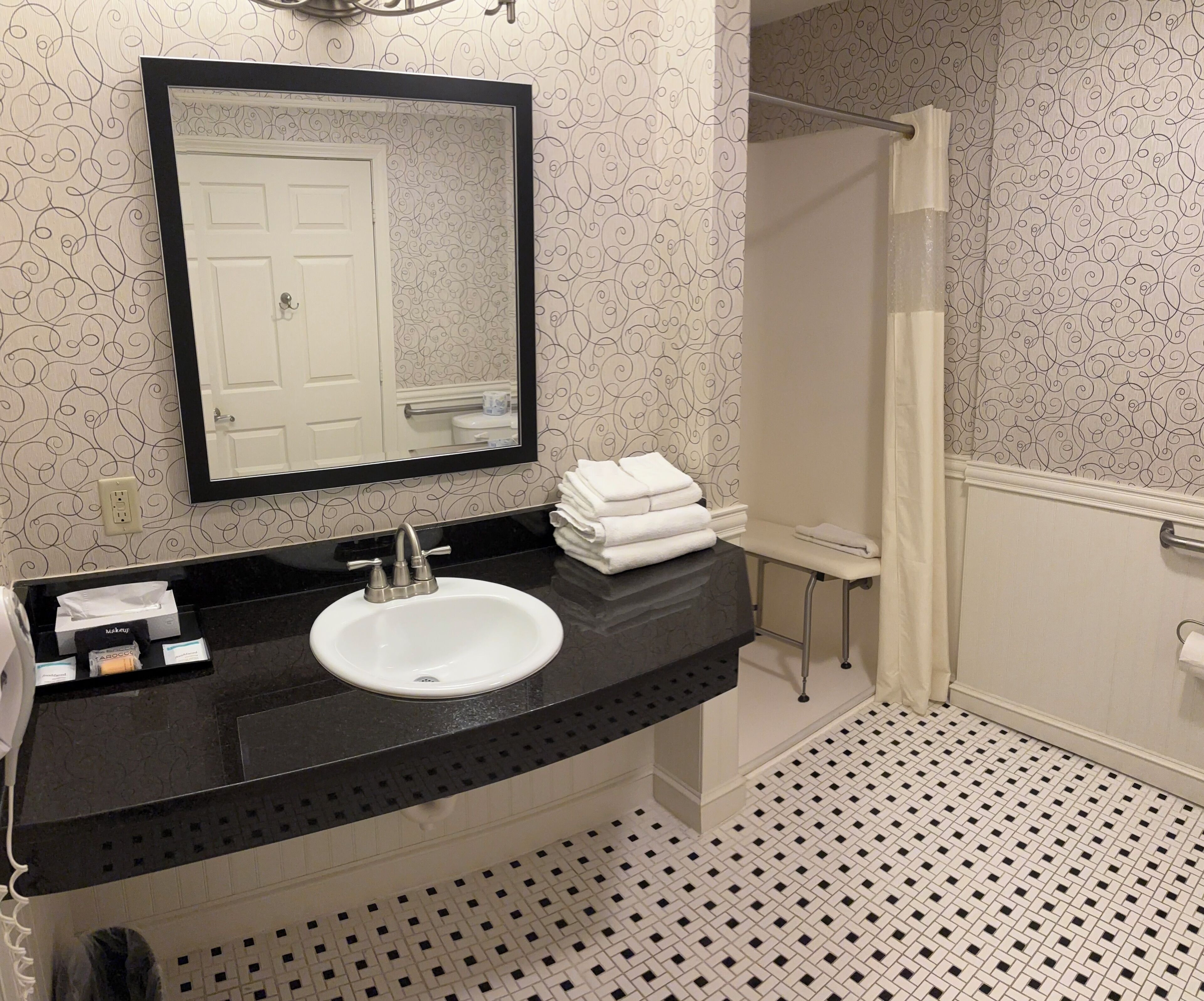 single room, multiple beds, roll-in shower | bathroom | free toiletries, hair dryer, towels