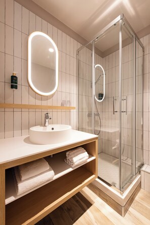 Eco-friendly toiletries, hair dryer, towels, soap