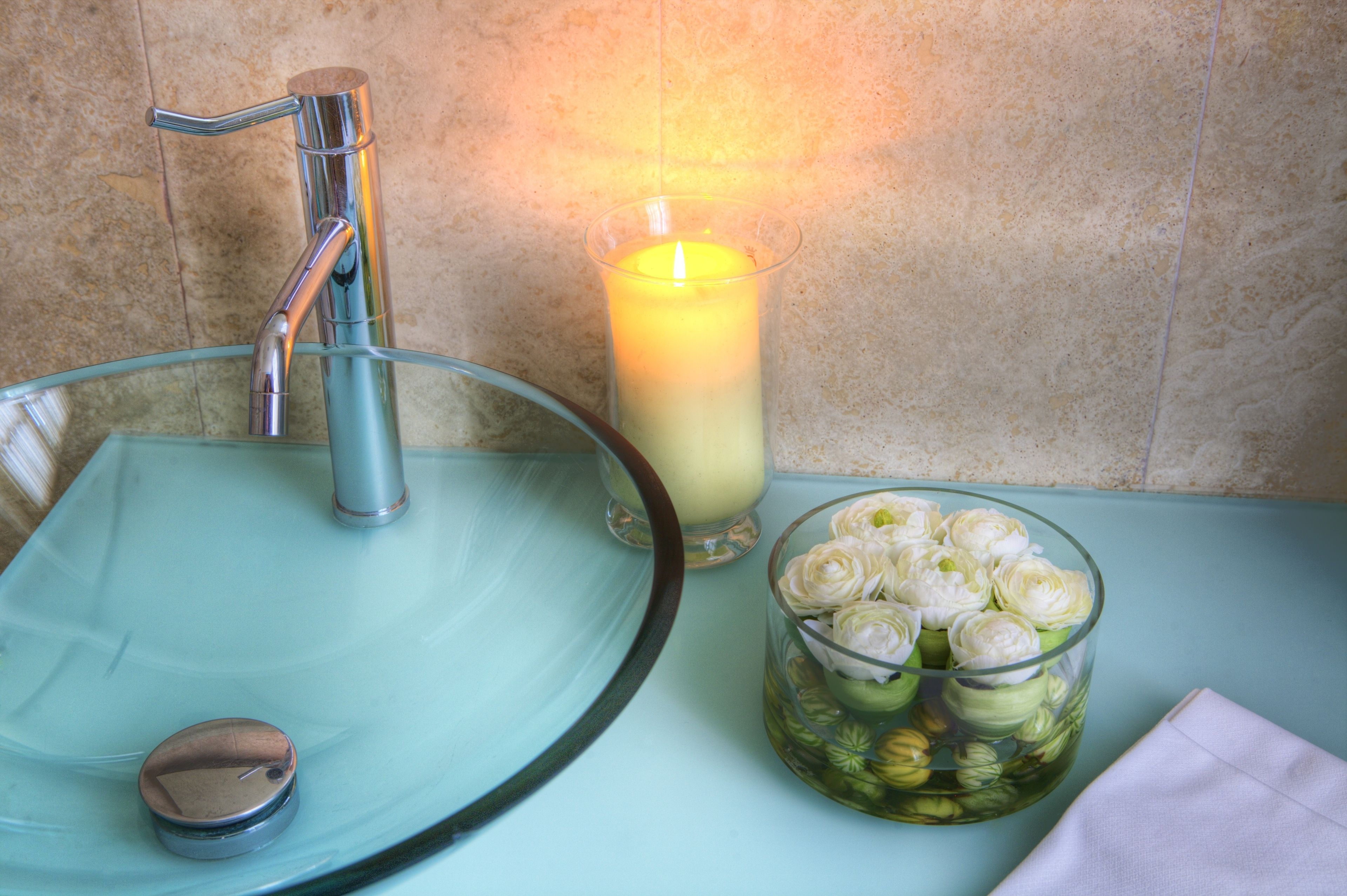 designer toiletries, hair dryer, bidet, towels