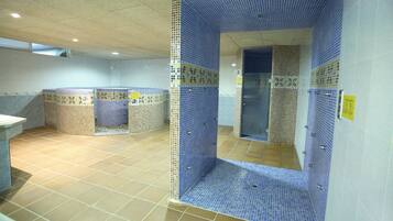 Clean and well-maintained restroom with two sinks and mirrors.