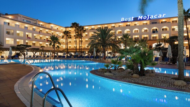 A hotel with a swimming pool, palm trees, and a sign reading "Best Mojacar". - Hotel Best Mojácar (Mojacar)