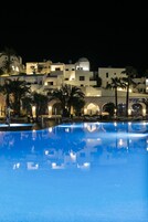Outdoor pool, open 10:00 AM to 7:00 PM, pool umbrellas, sun loungers