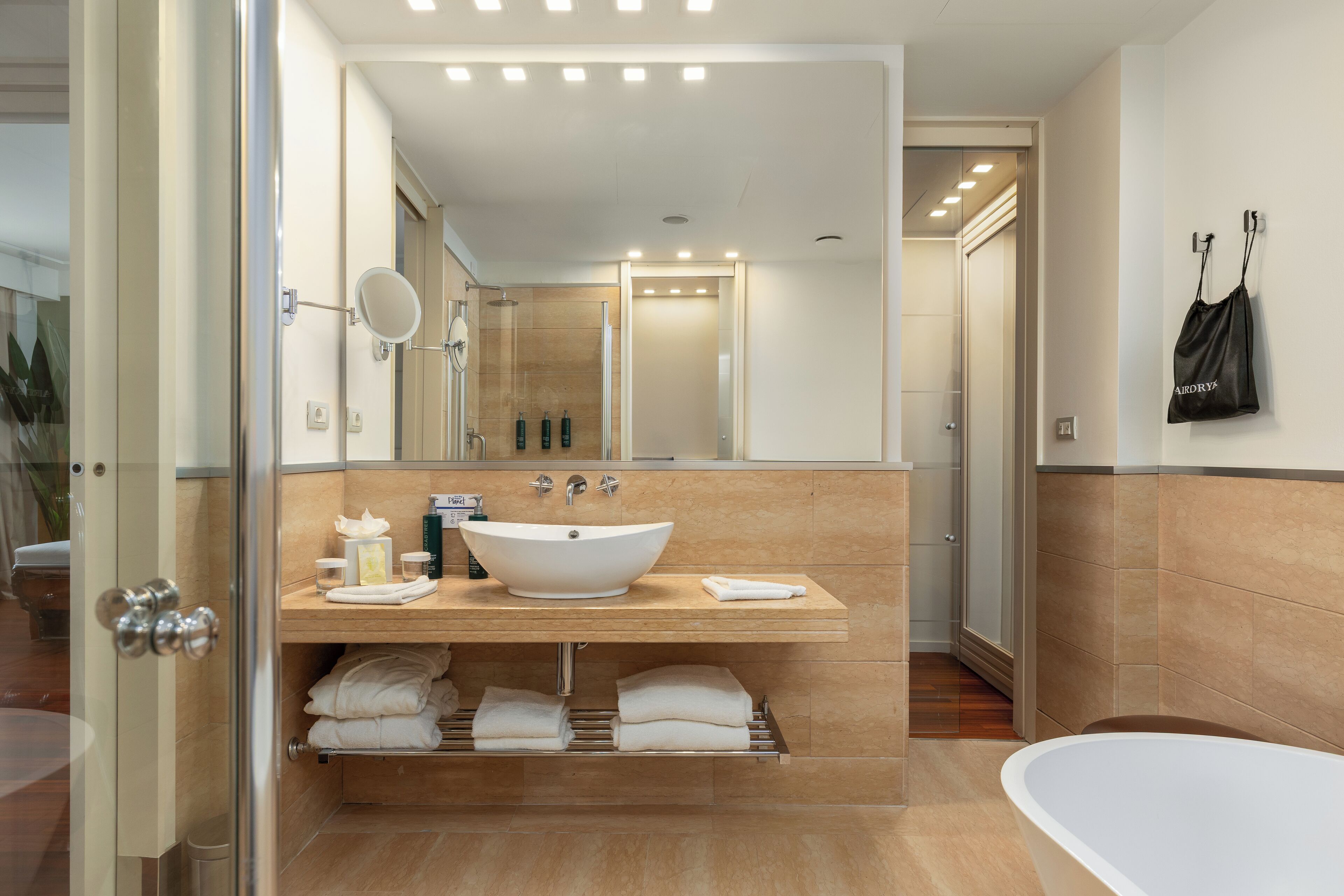 junior suite, 1 king bed (family) | bathroom | shower, free toiletries, hair dryer, slippers