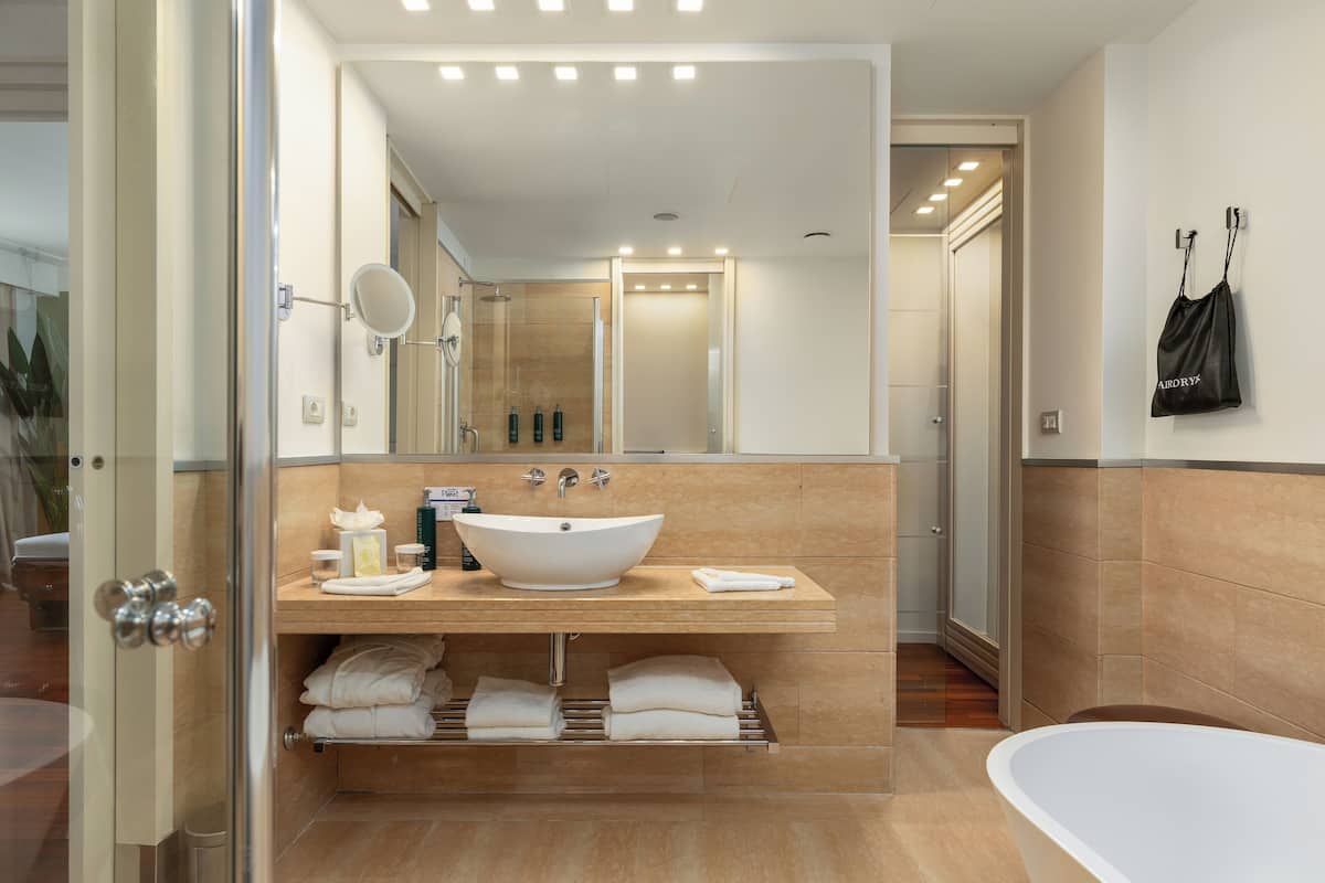 junior suite, 1 king bed (family) | bathroom | shower, free toiletries, hair dryer, slippers