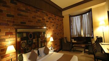 Habitación ejecutiva, 1 cama Queen size | Ropa de cama de alta calidad, minibar y decoración personalizada