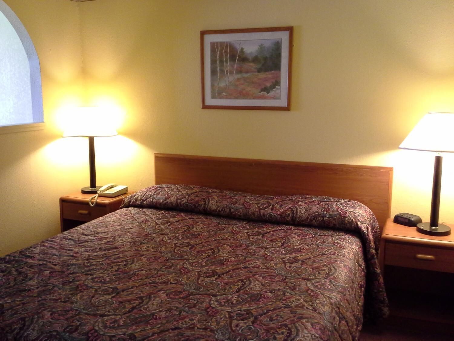 Premium bedding, desk, laptop workspace, soundproofing
