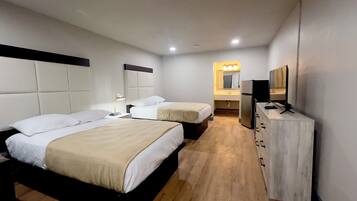 Premium bedding, desk, laptop workspace, soundproofing