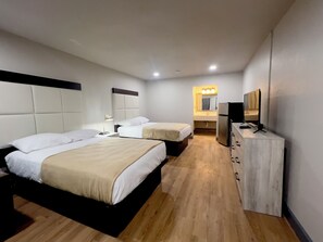 Premium bedding, desk, laptop workspace, soundproofing