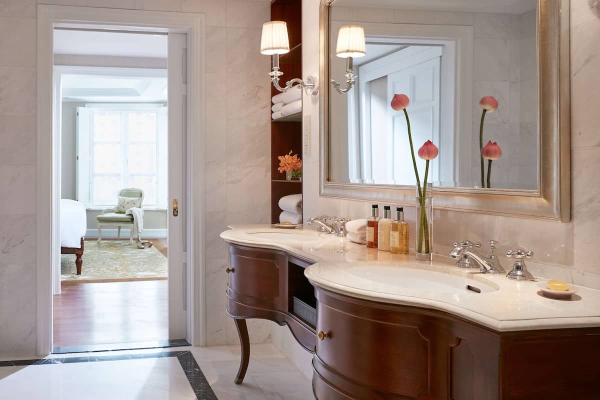 combined shower/bathtub, rainfall showerhead, designer toiletries