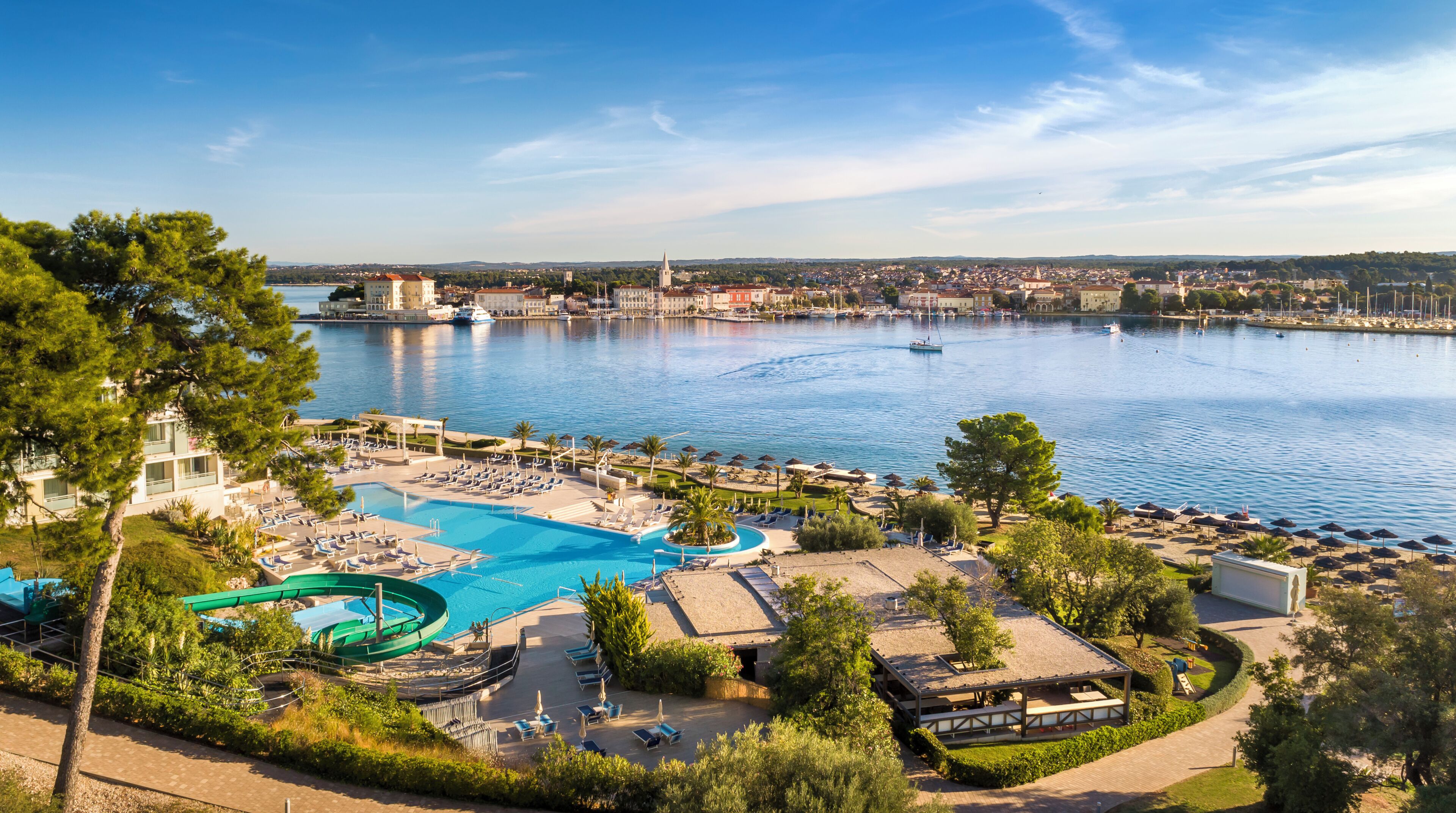 Indoor pool, outdoor pool, pool umbrellas, sun loungers