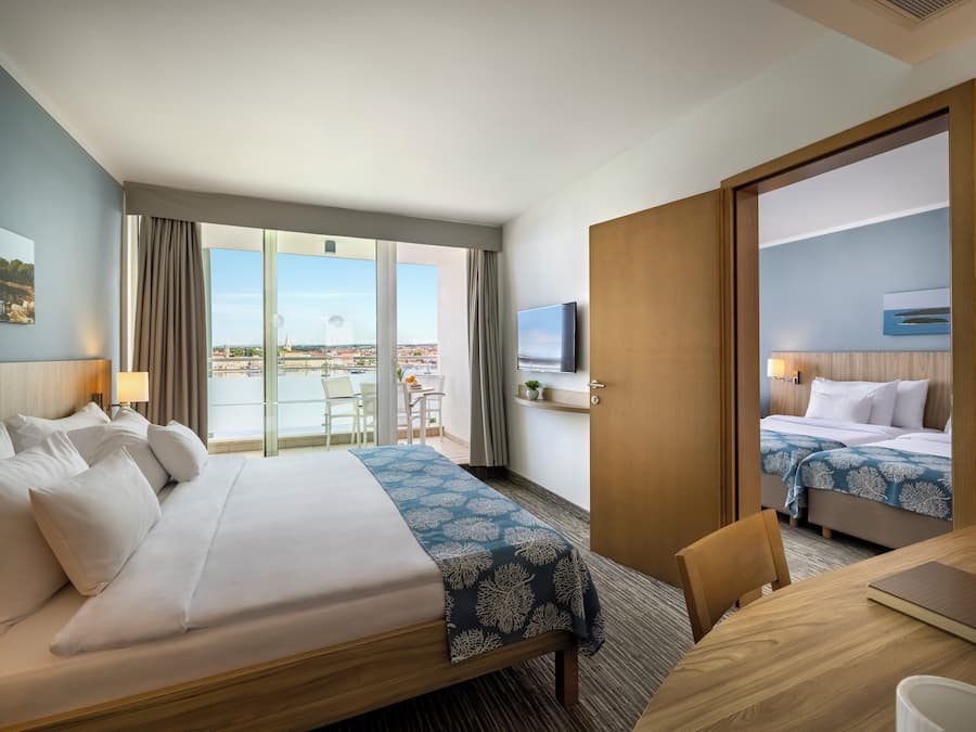 Superior Family suite, Seaview, Balcony | Minibar, in-room safe, desk, cots/infant beds