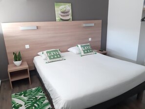 Premium bedding, individually furnished, desk, blackout drapes