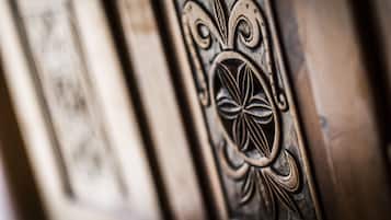 A close-up of a decorative metal panel with intricate patterns.
