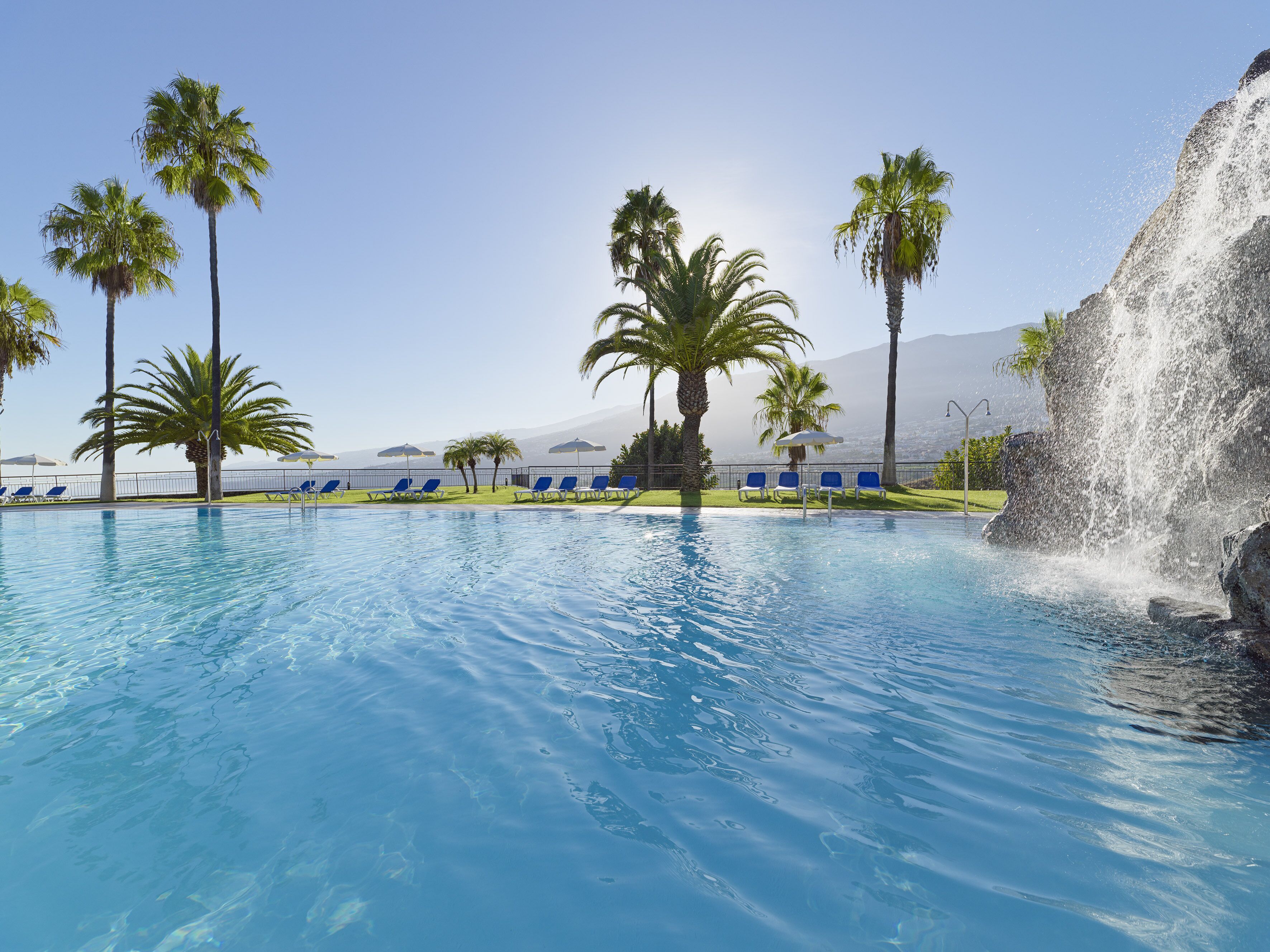 2 outdoor pools, pool umbrellas, pool loungers