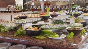 A buffet with various food items and a tiled backsplash. - Hotel Las Aguilas Tenerife, Affiliated by Melia (Puerto de la Cruz)