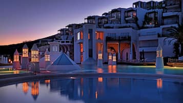 Experience the hotel's unique architecture and enjoy a rooftop terrace with multiple balconies.